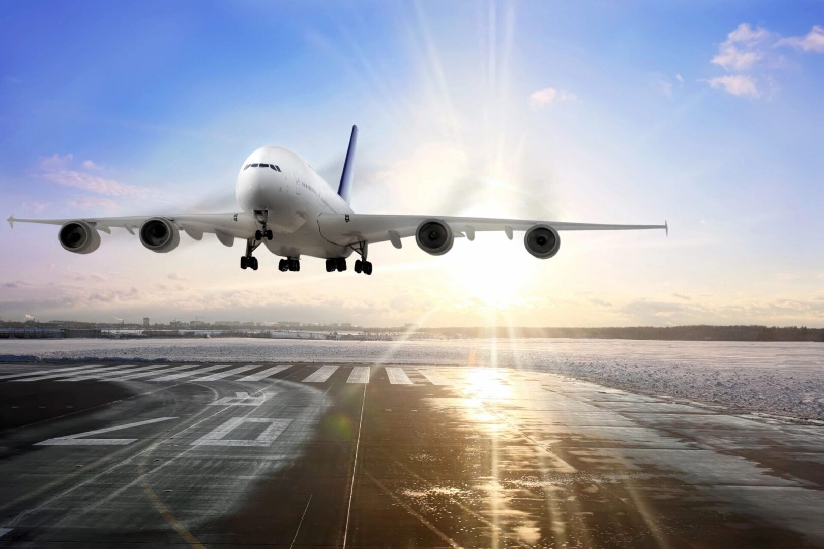 A large jetliner taking off from an airport runway.